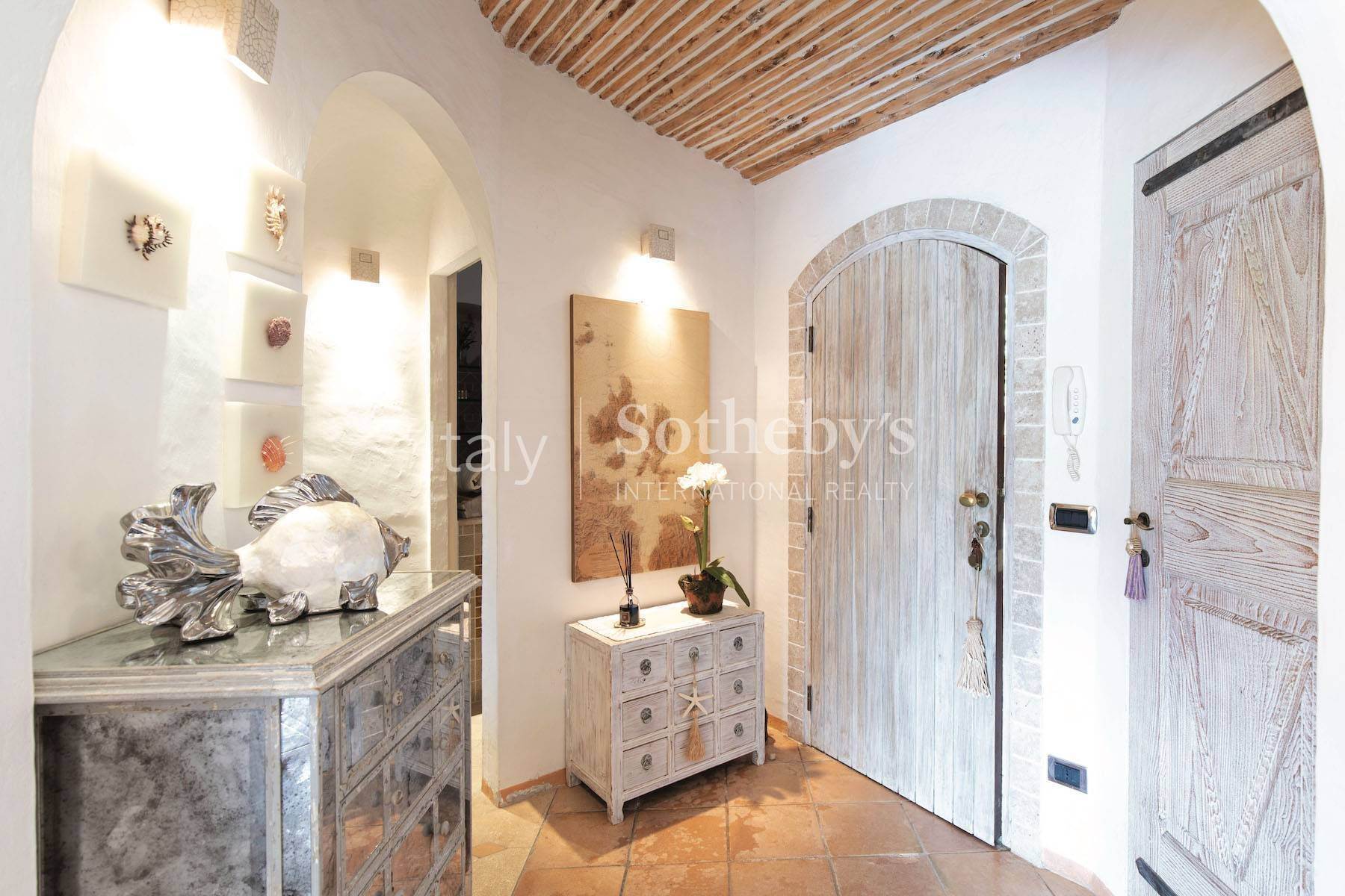 23. Apartments for Sale at Cozy and turnkey semi-detached villa on the Pevero Golf hill Porto Cervo, Sassari Italy
